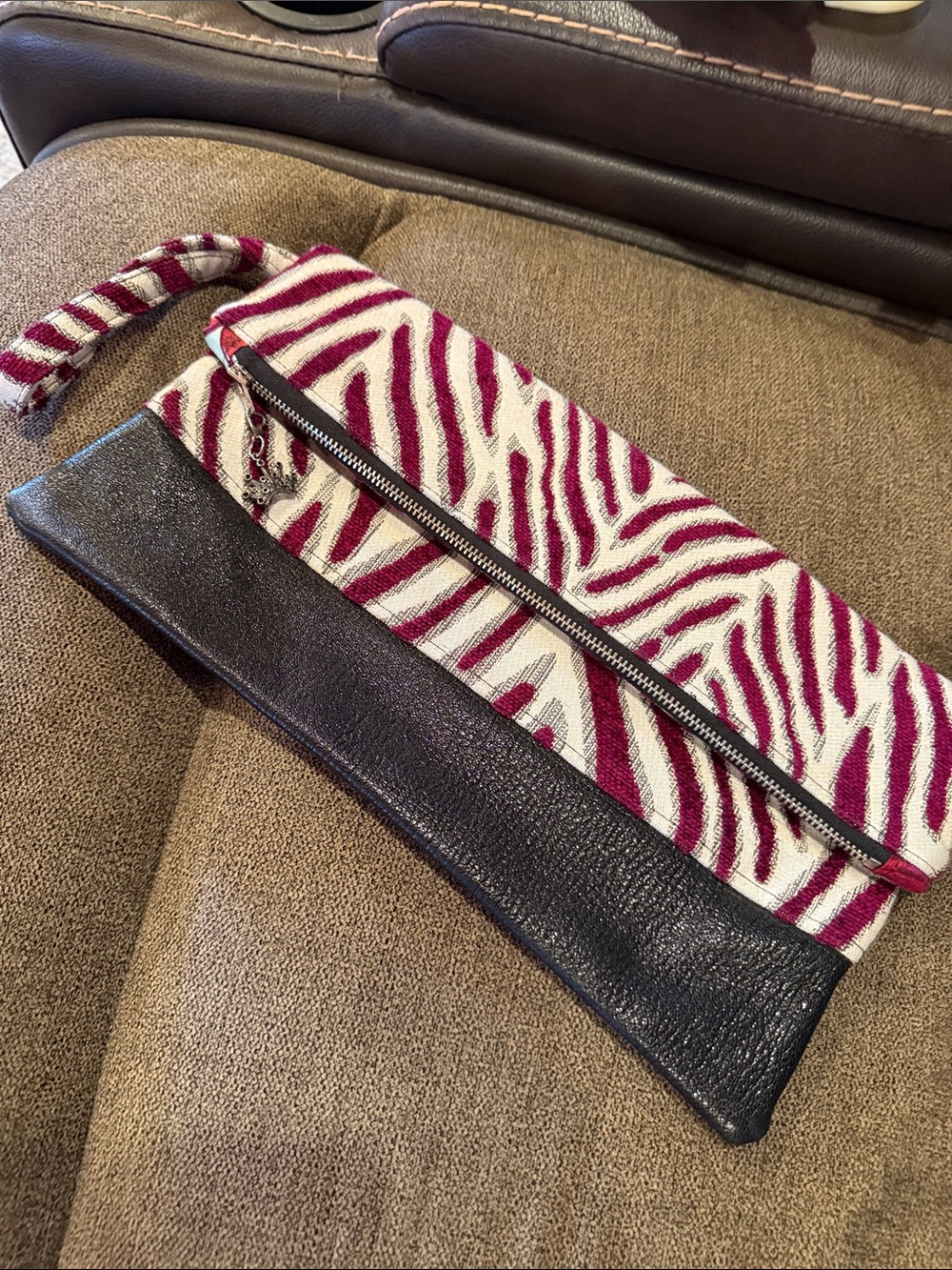 Fuchsia Zebra-Print Fold-Over Clutch with Black Trim